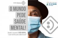 Arte da campanha Janeiro Branco 2023. Na foto um homem negro, de chapéu preto, usa máscara azul
