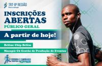 Arte gráfica com a imagem de um homem atleta negro do lado direito, e informações sobre a inscrição da corrida contidas no texto