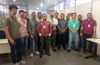 Foto do instrutor Reinaldo Gil e equipe do TRT21 no treinamento.