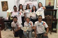Foto: Desembargadora, juíza, representantes da CNBB e voluntários do TRT8 exibem ventarolas e camisetas da marcha.