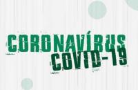 cartaz nas cores verde e branco dando instruções como se proteger do coronavirus